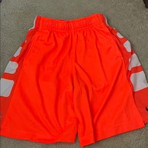 Orange and white nike elite shorts (children’s)